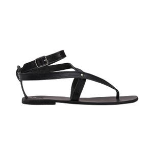 May include: Black leather sandals with a buckle strap and a simple design.