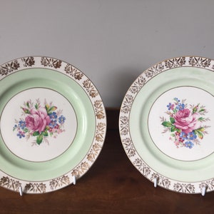 A pair of vintage J & G Meakin Sol china cake plates with pink roses and gilding