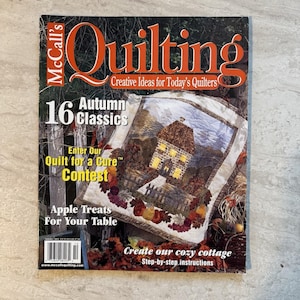 May include: A magazine cover for McCall's Quilting. The cover features the magazine title in large orange letters. The cover also includes text that reads "16 Autumn Classics", "Enter Our Quilt for a Cure Contest", and "Apple Treats For Your Table".