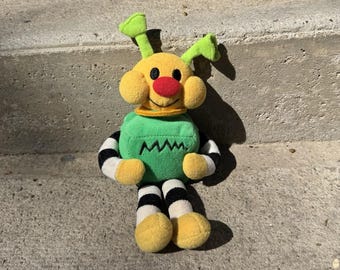 Juguete de peluche CompUSA Kids Pixel 1998 Robot amarillo y verde de 9 pulgadas