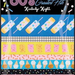 May include: Designer ribbon pack with an 80s theme. The design includes ribbons with popsicles, gummy bears, ice cream cones, and fried eggs. The text on the top reads "80's Greatest Hits" and "Kimberly Kight".