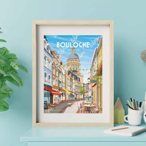 May include: A light wood framed print featuring a vibrant illustration of a charming street scene in Boulogne-sur-Mer. The artwork showcases colorful buildings, flags, and outdoor cafes, creating a cheerful and inviting atmosphere. The text 'BOULOGNE SUR MER' is prominently displayed. The print is ideal for adding a touch of European flair to any space.