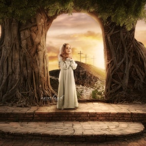 May include: A young person in a long, light-colored dress stands before a stone archway framed by large trees. The background features a sunset and three crosses on a hill. The image has a soft, ethereal quality.