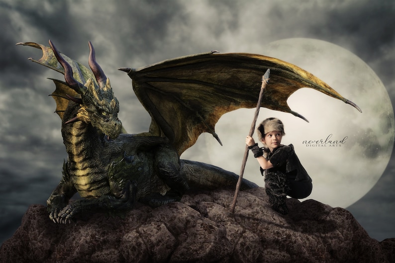 May include: A fantasy digital art image featuring a green and gold dragon with large wings, perched on a rocky surface. A child in a fur hat and outfit holds a spear, with a full moon in the background. The text "NEVERLAND DIGITAL ARTS" is visible.