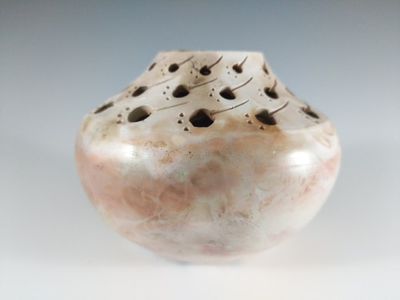 Pit Fired Vessel With Pierced And Carved Pattern Art
