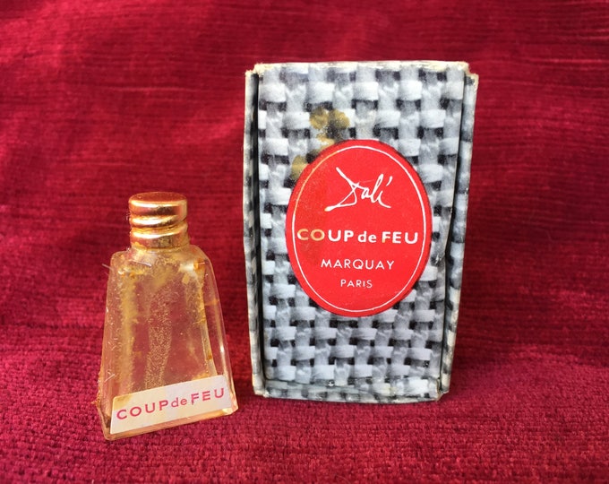 rare flacon à parfum miniature coup de feu parfumerie Marquay / dessiné par l'artiste Dali