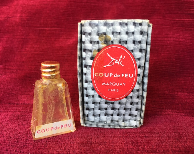 rare flacon à parfum miniature coup de feu parfumerie Marquay / dessiné par l'artiste Dali