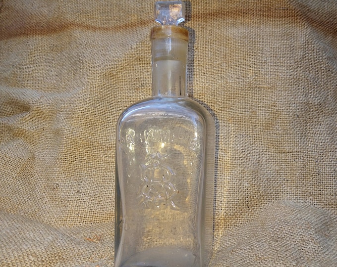 flacon à parfum ancien en verre soufflé, parfumerie A L Ixia