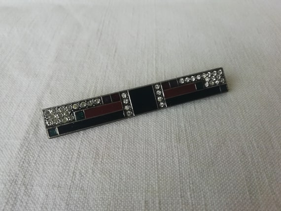 Broche avec pavage de strass violet et pampilles. - Bijoux Anciens Schaffner