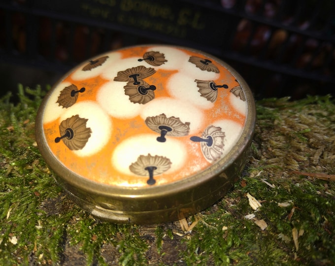 Petit poudrier ancien en métal by Coty dessiné par R.Lalique