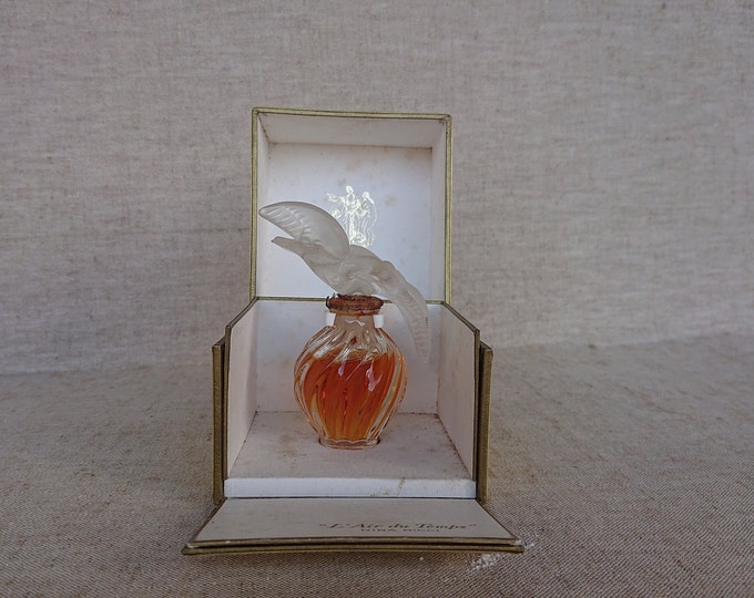 ancien flacon à parfum de collection, l'air du temps de Nina Ricci