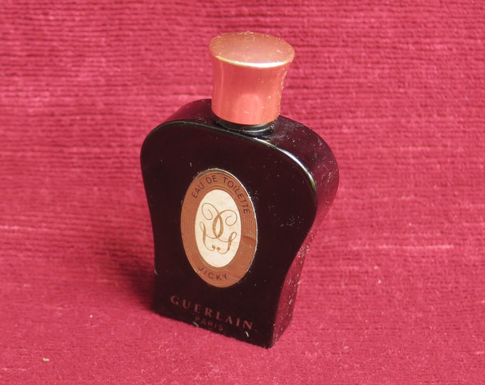 ancien flacon à parfum miniature lyre noire de Guerlain, eau de toilette Jicky, verre noir, 1962
