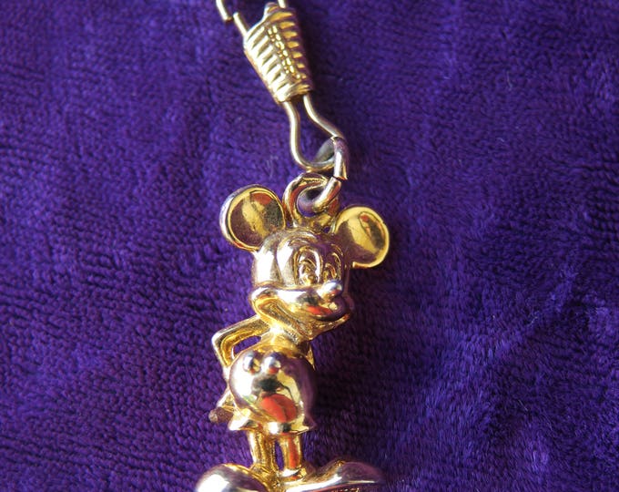 Walt Disney video figurine Mickey en métal doré à accrocher sur un porte clé