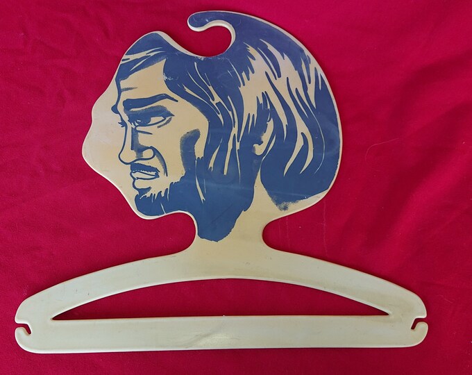 ancien cintre plastique vintage tête d'homme vers 1970