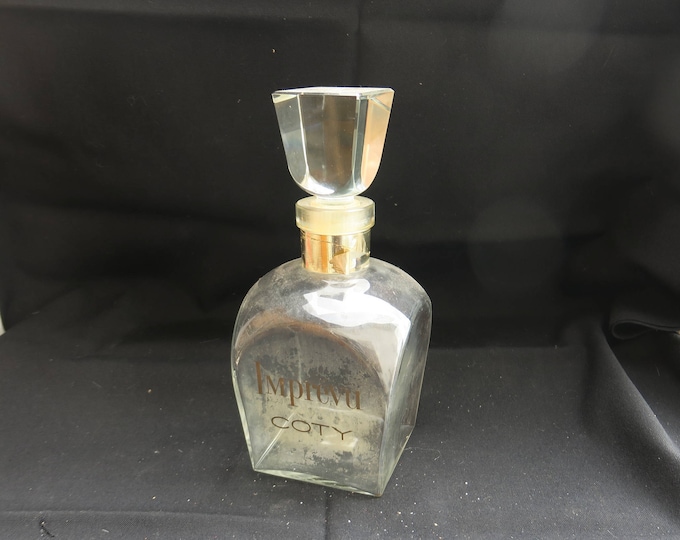 ancien flacon à parfum géant Imprévu de Coty, publicité vitrine de parfumerie