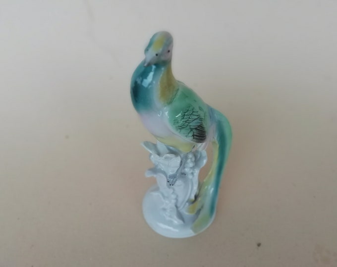 superbe oiseau en porcelaine vintage, faisant