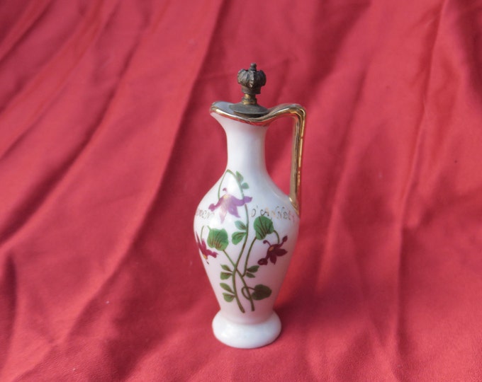 ancien flacon en porcelaine publicitaire des années 60, cyclamen d'Annecy parfumerie Sylva,