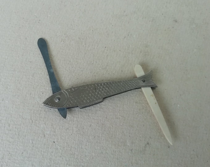 ancien nécessaire à ongle en forme de poisson