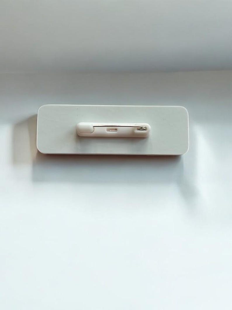 Personalised Acrylic Name Badge With PVC Embellishment Medicine Bottle