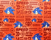 Fabric. Sonic Sega Genesis Video Game. Sonic the Hedgehog. Sega. Robert Kaufman Licensed Novelty Cotton Fabric QTR