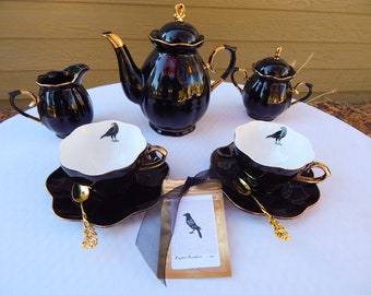 Edgar Allan Poe  The Raven Tea Set  Black Gold Porcelain Teapot  sugar bowl, creamer, two Crow teacups, gold plated spoons, tea packet,