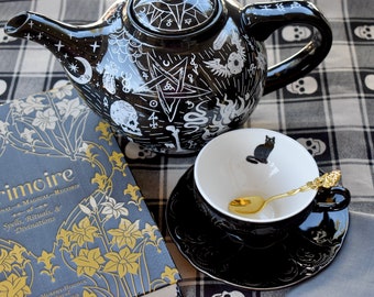 Black Cat Victorian Goth Tea Cup and saucer  Black embossed porcelain  gold plated spoon  Themed tea packet. Comes with gift box