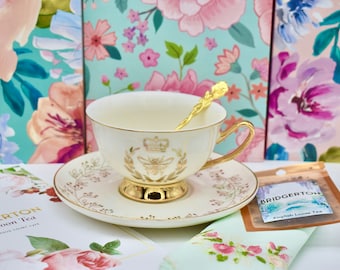 Bridgerton Regency Queen Bee Ivory Pearl with Gold Tea Cup and Saucer with Spoon  Embroidered Napkin  Tea Pack, Gift Box  Bridal Shower gift