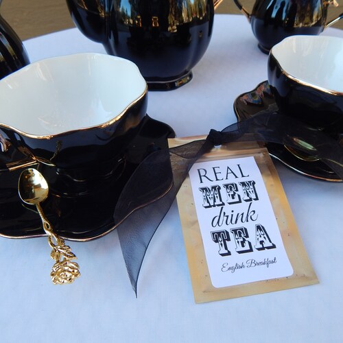 Real Men Drink Tea gift set. Bourbon Whickey tea, shops Black and Gold Porcelain Teapot, sugar bowl, creamer, two teacups, gold plated spoons