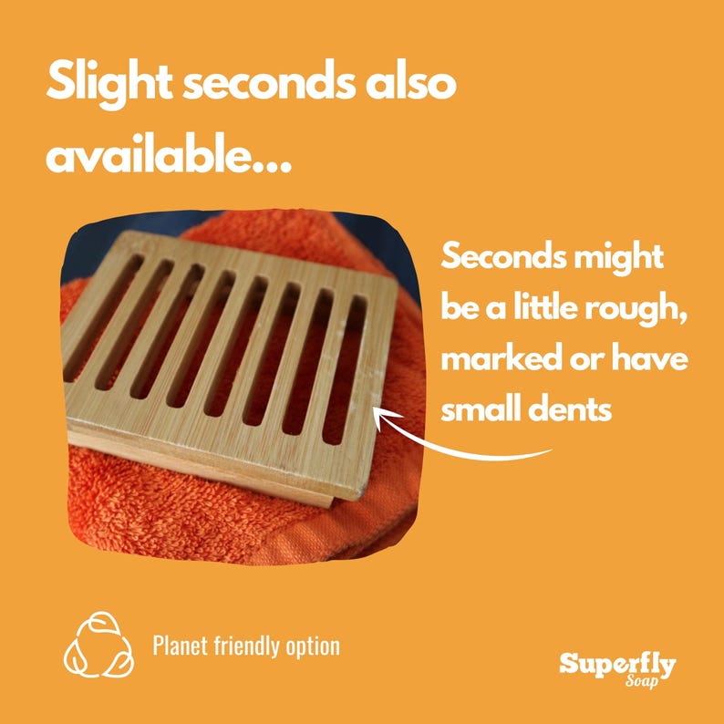 May include: A wooden soap dish with a slatted design. The dish is on a bright orange towel. The text "Slight seconds also available..." is at the top of the image. The text "Seconds might be a little rough, marked or have small dents" is at the right of the image. The text "Planet friendly option" is at the bottom left of the image. The text "Superfly Soap" is at the bottom right of the image.