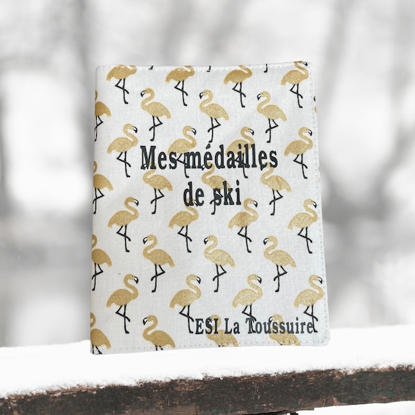 Pochette pour medailles de ski flamants rose dorés