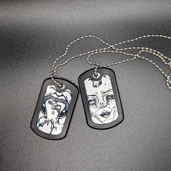 Original art dog tags, split tongue and psycho skull designs