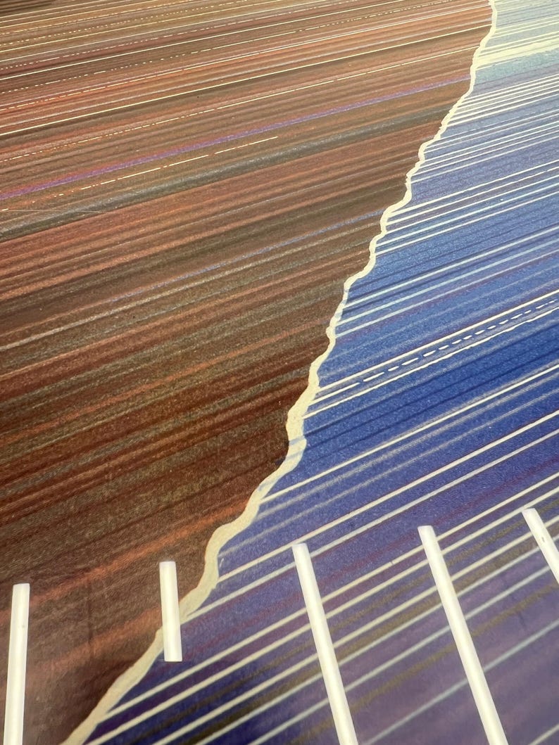 May include: Abstract art piece with a color gradient. The left side features a brown and red color scheme with horizontal lines. The right side has a blue and purple color scheme with white lines. The two sides are separated by a wavy, off-white line.