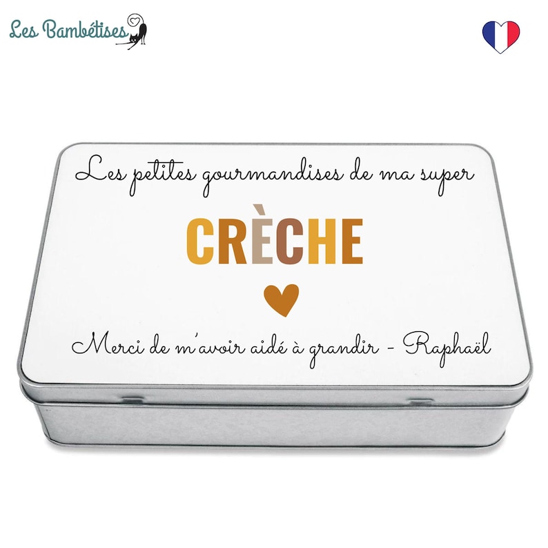 May include: A rectangular metal tin with a white lid featuring the text "Les petites gourmandises de ma super CR&Egrave;CHE" in black and gold lettering, with a gold heart and the text "Merci de m'avoir aid&eacute; &agrave; grandir - Rapha&euml;l".