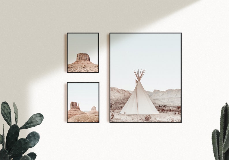 May include: Three framed prints of desert landscapes. The left and right prints feature rock formations in a desert setting. The center print features a white teepee in a desert landscape.