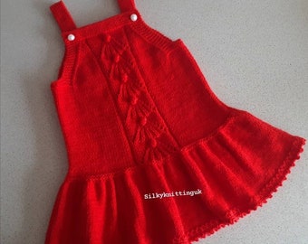Hand knitted baby dresses, knitted baby clothes