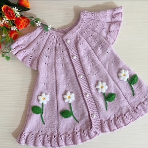 hand knitted baby girl cardigan ,knitted baby clothing ,baby knits ,kids cardigan ,baby gift