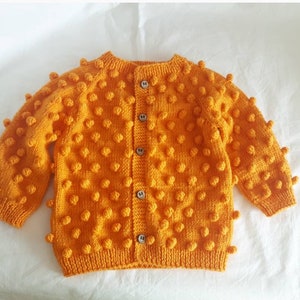 hand knitted popcorn baby cardigan ,knitted baby clothes, unisex baby cardigan