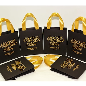 25 Mr & Mrs Wedding Willkommen Taschen Satinband Griffe mit Namen, personalisierte schwarz und Gold Hochzeitsparty Gefälligkeiten für Gäste