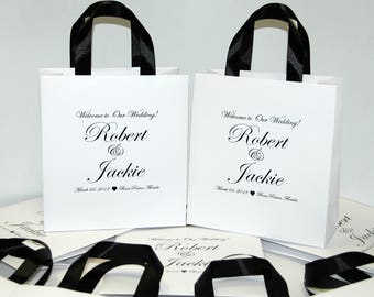 30 bolsas de bienvenida de boda con asas de cinta de satén y sus nombres Elegantes bolsas de favor personalizadas para los huéspedes del hotel Regalos y favores de boda