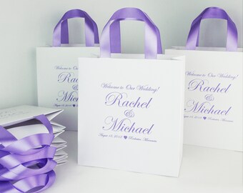 25 bruiloft welkomsttassen met lavendel satijnen lint handgrepen en uw namen - Elegante gepersonaliseerde huwelijksgunst tassen voor gasten