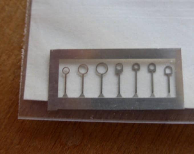 Pack of 7 hooks for racing and road cars for 1:43 scale models Carrara Models SP26