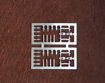 1:43 scale photoetched sheet with windscreen supports for older F.1 and racing cars and various bonnet hooks Remember TK296