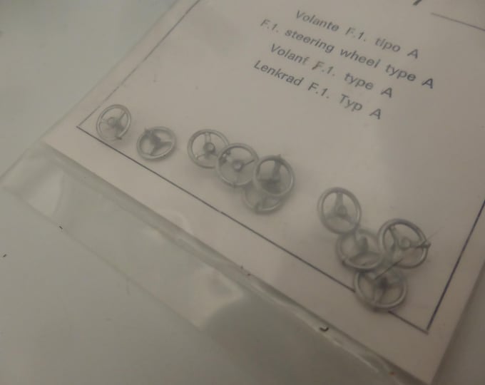 1:43 scale three-spoke steering wheels for Formula 1 cars of the 60-70s etc (pack of 10, white metal) Meri Kits P7