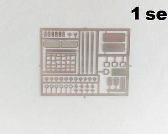 Set of photo-etched hooks, grilles, pedals, IMSA nets and other small parts for racing GT and sports cars 1:43 scale models