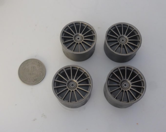 1:18 set of 4  plastic racing 15-spokes wheels (2 front, 2 rear) plus aluminium machined hubs SILVER