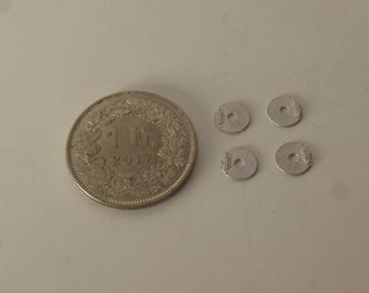 1:43 scale white metal brake disks for racing and sportscars of the 60-70-80s (pack of 4 pieces)