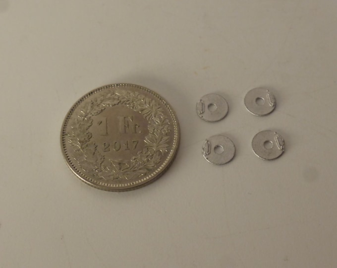 1:43 scale white metal brake disks for racing and sportscars of the 60-70-80s (pack of 4 pieces)