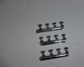 1:43 photo etched three wings wheelspins LHD/RHD (chromed plastic, pack of 12 pcs) Meri P42