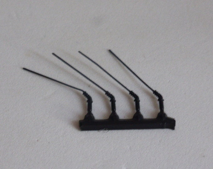 set of 4 plastic aerials antennas moulded with base (45 degrees) for 1:43 models