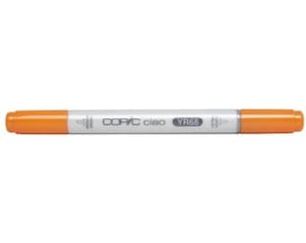 May include: A Copic Ciao marker with a yellow-orange color. The marker has a white barrel with the text "COPIC Ciao YR68" printed on it.
